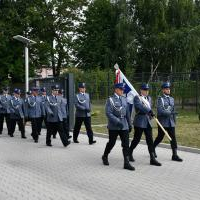 Święto Policji Miech&oacute;w 2019 - przemarsz pododdział&oacute;w z pocztem sztandarowym